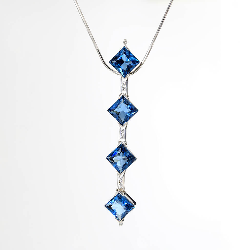 “Rocky Mountain Blues” – SS Pendant, London blue topaz, white diamonds