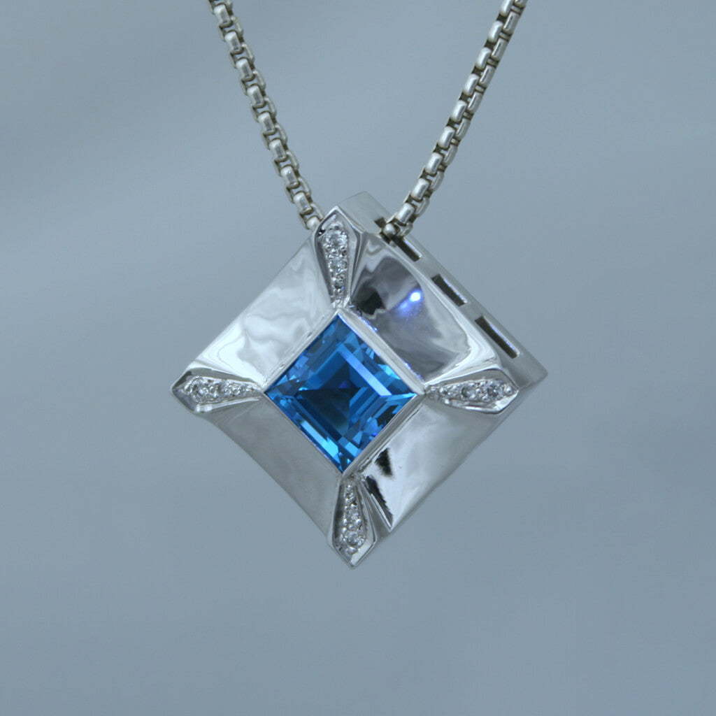 “Amulet” – SS Pendant, princess cut London Blue Topaz, white diamonds